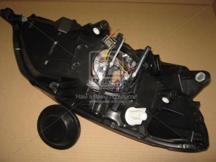 Фара лев. SK FABIA 10- TYC 20-E322-05-2B